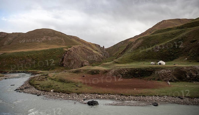 Yurt by a river, Desolate mountain landscape, Tian Shan, Sky Mountains, Sary Jaz Valley, Kyrgyzstan, Asia
