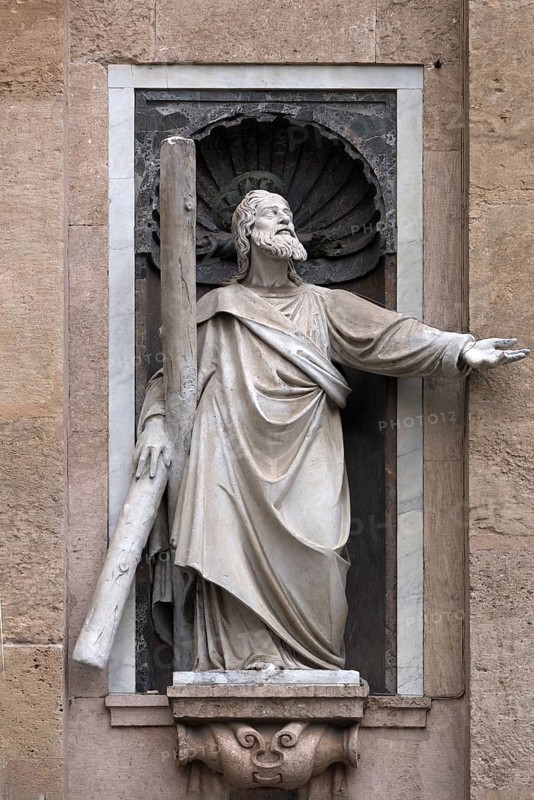 Sculpture of St Ambrose on the exterior façade of the Chiesa del Gesu, Via di Porta Soprana, 2, Genoa, Italy, Europe