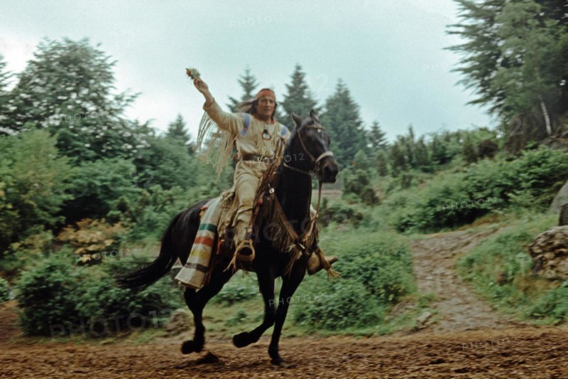 Pierre Brice as Winnetou rides in The Treasure in Silver Lake, horse, Karl May Festival, open-air theatre Elspe, Sauerland, North Rhine-Westphalia, Germany, June 1982, vintage, retro, old, historical, Europe
