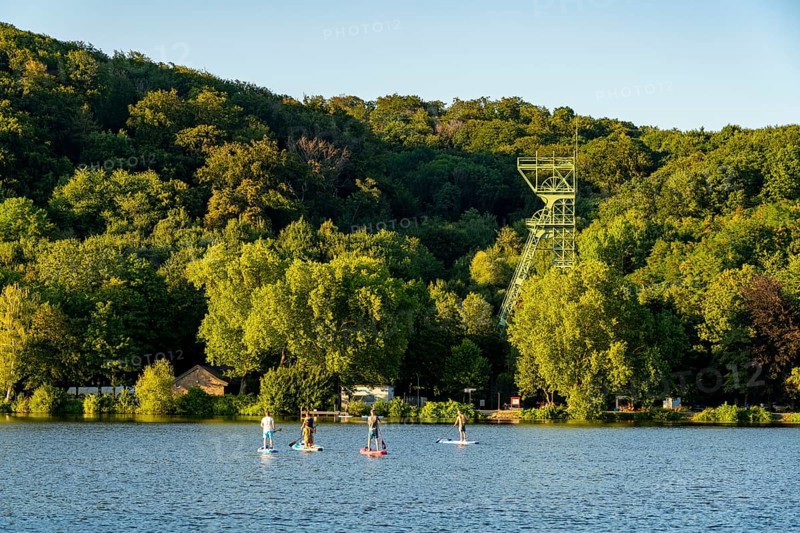 Lake Baldeney, stand up paddler, Sup, headframe of the former Carl Funke colliery in Heisingen, Essen, North Rhine-Westphalia, Germany, Europe