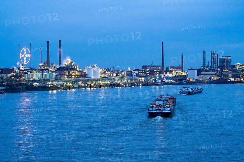Backdrop of Chempark Leverkusen, Bayer Leverkusen, chemical park, chemical plant, river Rhine, cargo ship, Leverkusen, North Rhine-Westphalia, Germany, Europe