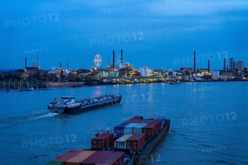 Backdrop of Chempark Leverkusen, Bayer Leverkusen, chemical park, chemical plant, river Rhine, cargo ship, Leverkusen, North Rhine-Westphalia, Germany, Europe