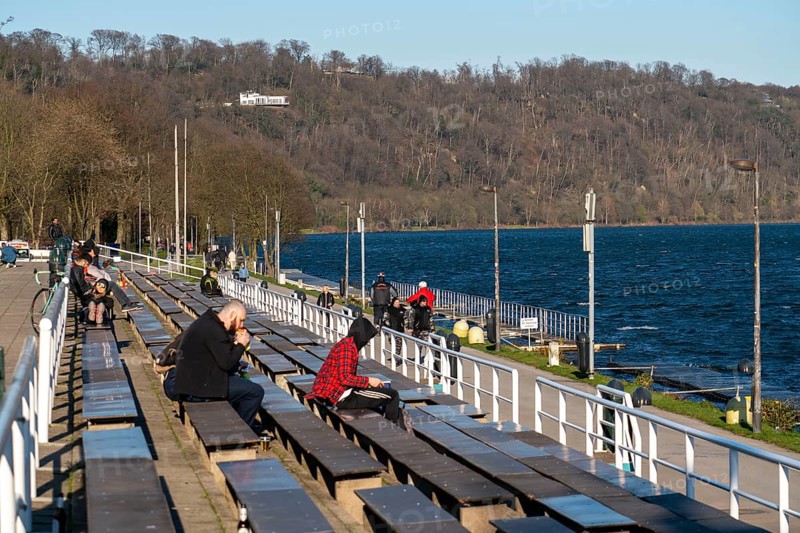Effects of the coronavirus crisis, few visitors at Lake Baldeney, regatta grandstand, despite the sunny weather, people keep their distance, Essen, Germany, Europe