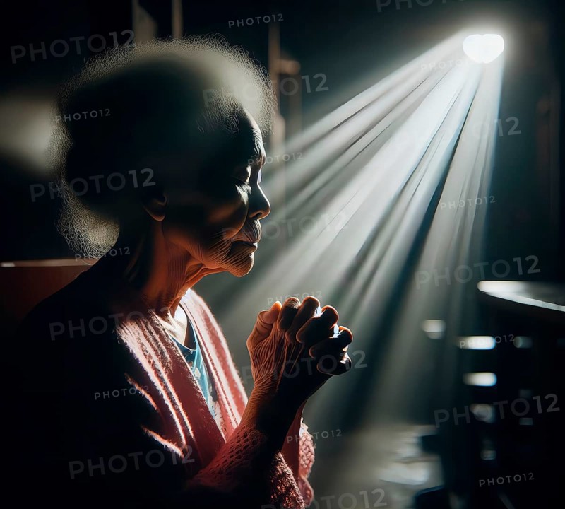 An old woman prays fervently with folded hands, Symbolic image believing, religious, prayer, AI generated, AI generated