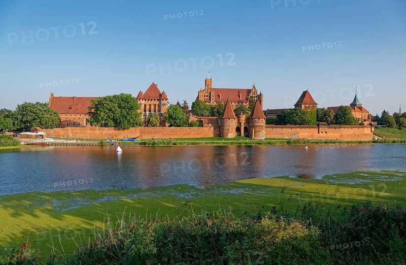 Marienburg Monastery, brick Gothic-style castle and former seat of the Teutonic Order, in the town of Marienburg in northern Poland. The castle is located on the River Nogat. It is a UNESCO World Heritage Site. Malbork, Pomerania, Poland, Europe