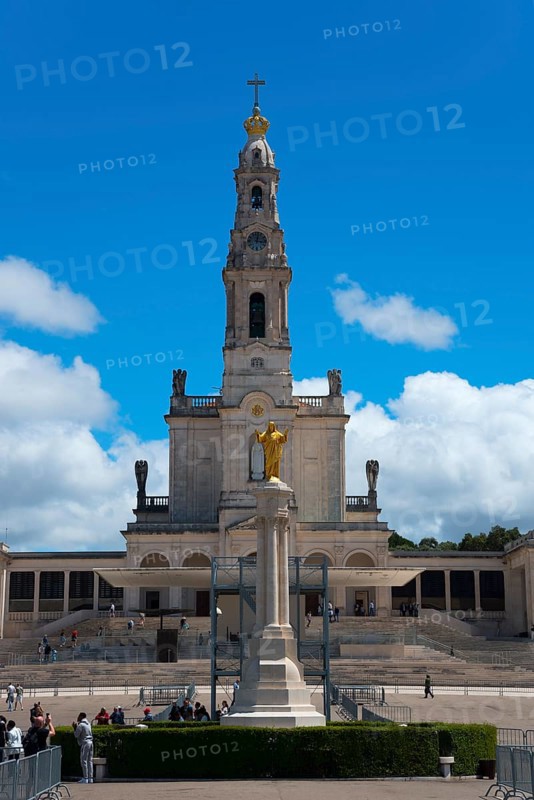 Large basilica with bell tower and statue in the foreground under a blue sky, Basilica of Our Lady of the Rosary, Santuario de Fatima, place of pilgrimage, Fatima, Fátima, Ourem, Santarem, Portugal, Europe