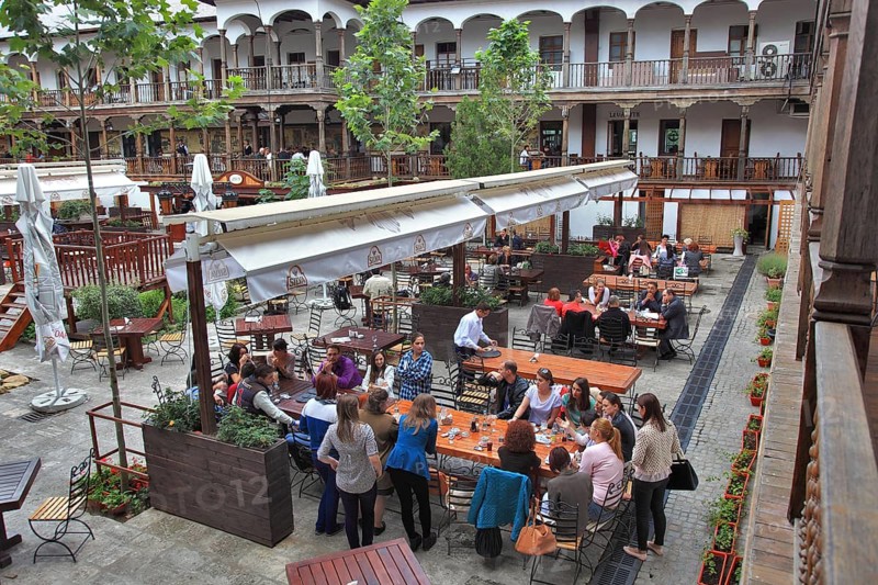 Bucharest, city centre, building, courtyard of the Hanul lui Manuc now houses restaurants, former caravanserai, wooden arcades, Romania, Europe