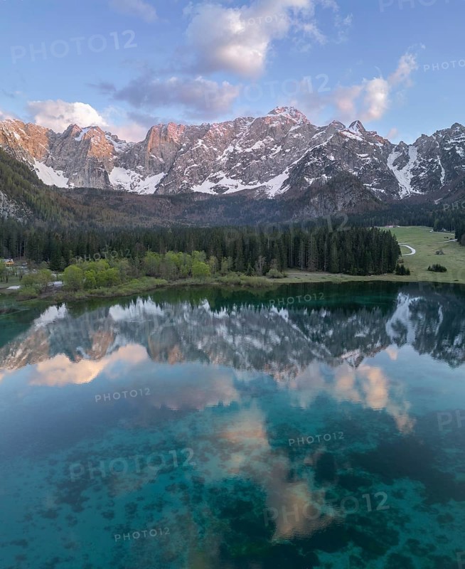 Aerial view of Lago Fusine with the Mangart massif in the background, Tarvisio, province of Udine, Italy, Europe