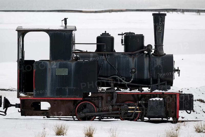 Historic mine railway in winter landscape, Kongsfjord, Ny-Ålesund, Spitsbergen Island, Svalbard and Jan Mayen archipelago, Norway, Europe