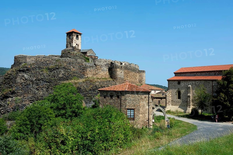 Medieval castle perched on a volcanic peak in Saint-Ilpize overlooking the Haut-Allier valley, Haute-Loire, Auvergne-Rhone-Alpes, France, Europe