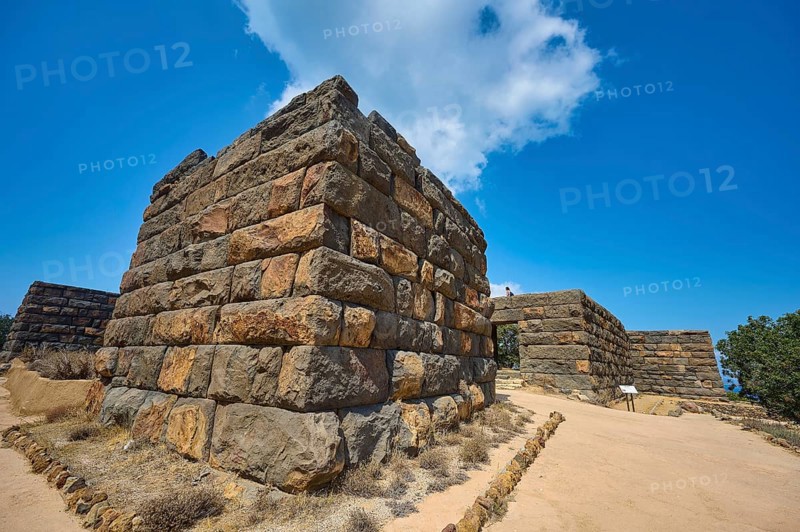 Ancient ruined wall under a clear blue sky, Palaiokastro, Ancient fortress, 3rd and 4th century BC, above Mandraki, Nisyros, Dodecanese, Greek Islands, Greece, Europe