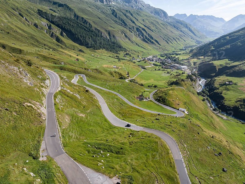 James Bond Goldfinger curve viewpoint on the Furka Pass. Scenes for the James Bond film Goldfinger were filmed on the winding mountain road in 1964 against a picturesque backdrop. Drone photo. Realp, Canton Uri, Switzerland, Europe