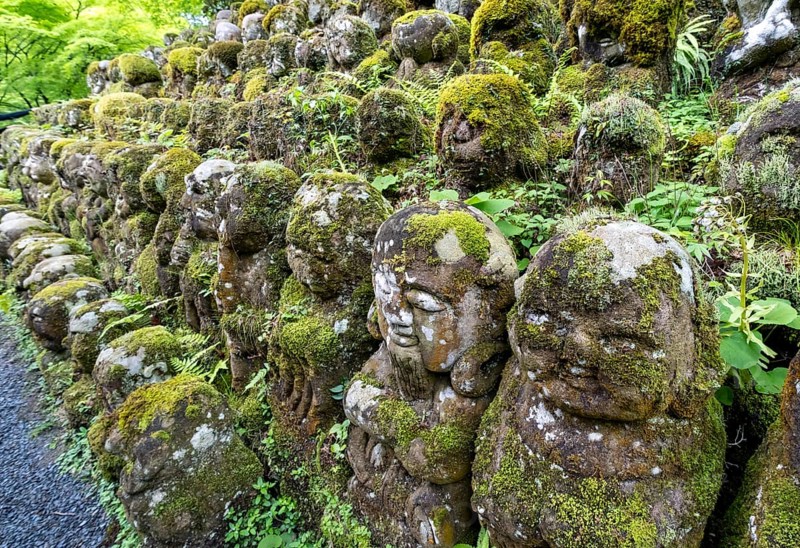 Moss-covered stone statues of rakans, the disciples of Buddha, Otagi Nenbutsu-ji temple, Kyoto, Japan, Asia
