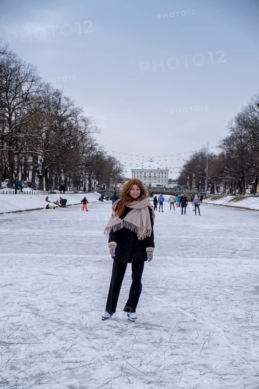 Ice skaters on the Nymphenburg Palace Canal, Nymphenburg in winter, Munich, Upper Bavaria, Bavaria, Germany, Europe