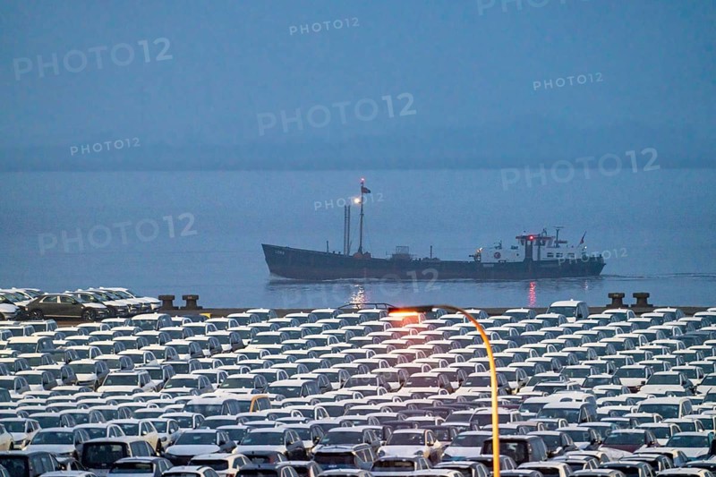 Parking space for import vehicles, hundreds of Hyundai Ioniq, electric cars, waiting for onward transport, ship on the Weser, at the EUROGATE container terminal in the overseas harbour of Bremerhaven, Lower Saxony, Germany, Europe