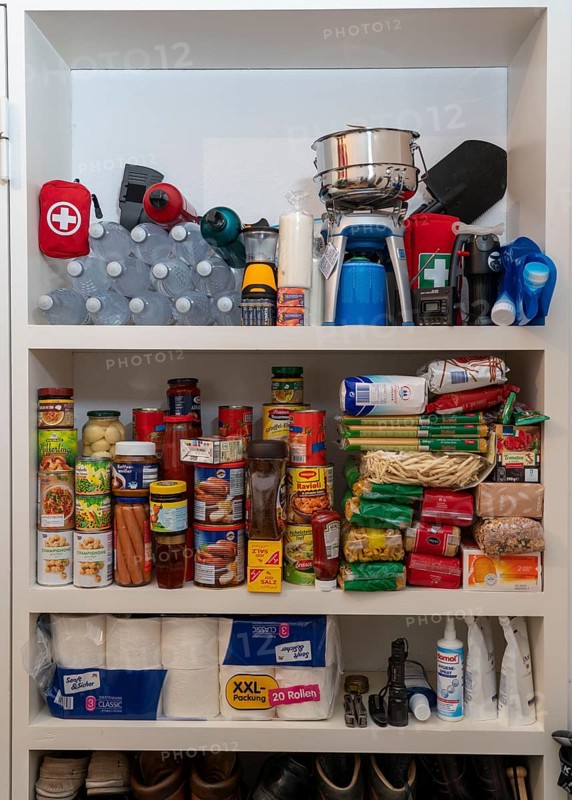 Emergency preparedness, food stock in a private household, shelf with long-life food, stock for 10 days, according to the recommendations of the Federal Office of Civil Protection and Disaster Assistance, emergency supplies, cooker, tools, candles, water canister, water filter