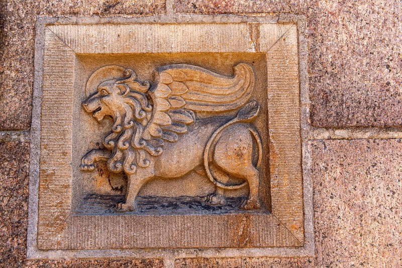 Odense, early Gothic St Albani Church, Roman Catholic church, entrance portal with sandstone figure, lion with wings, St Mark's lion, brick building, Fyn, island of Funen, Denmark, Europe