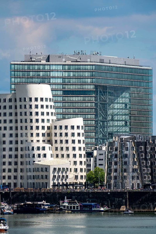 New Zollhof building complex, the Gehry buildings, at the Media Harbour, behind the Stadttor building, Düsseldorf, North Rhine-Westphalia, Germany, Europe