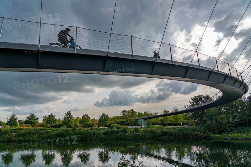 Bridge over the Rhine-Herne Canal near Gelsenkirchen Cycle and footpath, part of the ore railway line between Bochum and Gelsenkirchen, Zoom Bridge or Grimberger Sichel Bridge, Gelsenkirchen, North Rhine-Westphalia, Germany, Europe