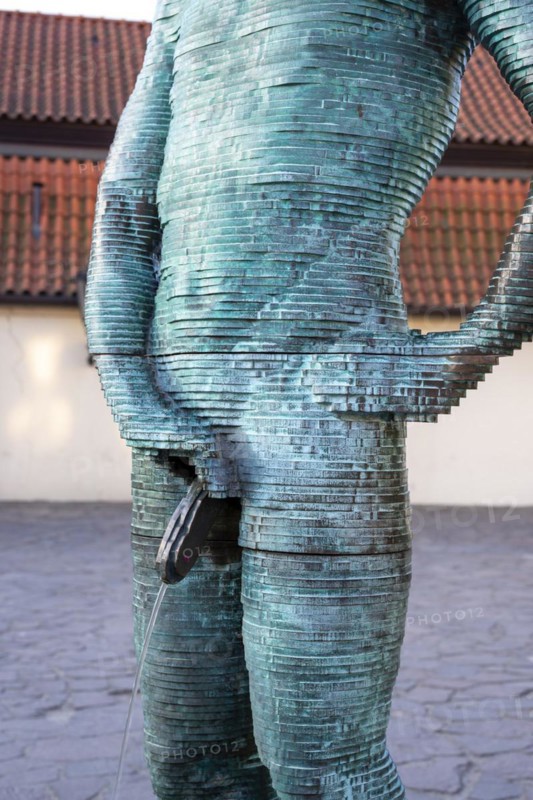 Two male figures peeing, sculpture by the artist David Cerny in front of the Franz Kafka Museum, Prague, Czech Republic, Europe