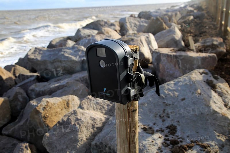 Wingscapes time lapse digital camera mounted on a post at Bawdsey, Suffolk, England, UK