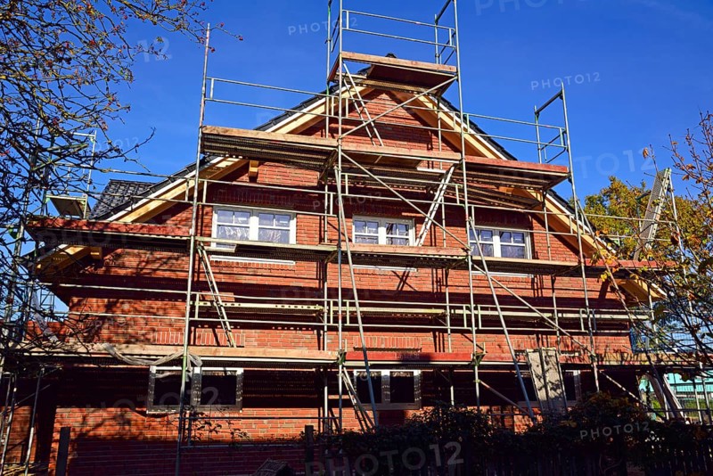 Europe, Germany, Lower Saxony, new build, residential building, apartment block, clinker brick building, pitched roof, scaffolding, Europe