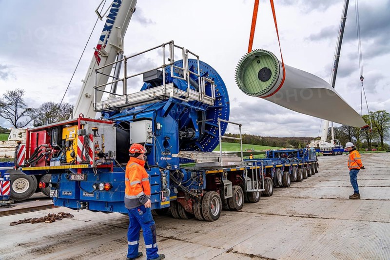 Preparation for the transport of a 68 metre long blade, a wind turbine, with a self-propelled Blade-Lifter vehicle, over a 40 km long route in the Bergisches Land, through towns, villages, over country roads, narrow through roads, to the construction site of the wind turbine near Hagen, North Rhine-Westphalia, Germany, Europe