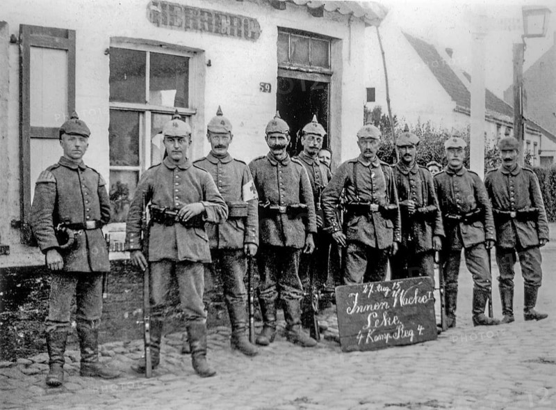 WWI German soldiers of the 4th Company of Reserve Ersatz Regiment 4 in front of tavern in the village Leke near Diksmuide, Dixmude, Belgium in 1915