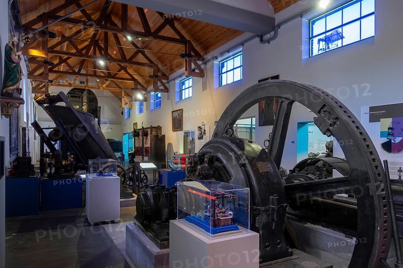Vintage dynamo and old machines in the Industrial Museum at the Le Bois du Cazier coal mine, Marcinelle near Charleroi, province of Hainaut, Belgium, Europe