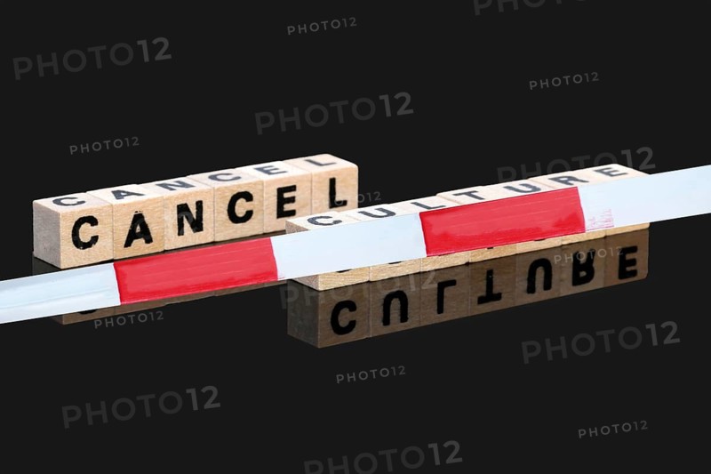 Symbolic image of the debate about the so-called Cancel Culture . Letter cubes show the words Cancel Culture, the word Culture is covered by a barrier tape but still visible