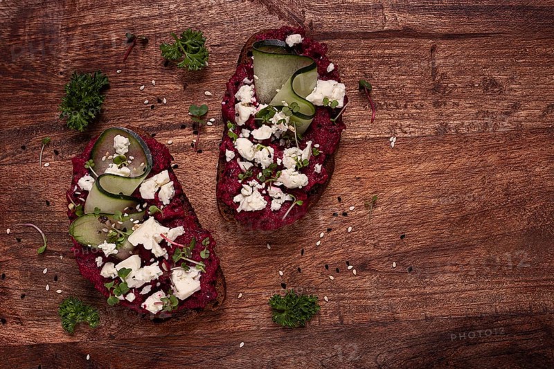 Sandwiches with beetroot hummus, cucumber and blue cheese, microgreens, rye bread, breakfast, homemade, no people