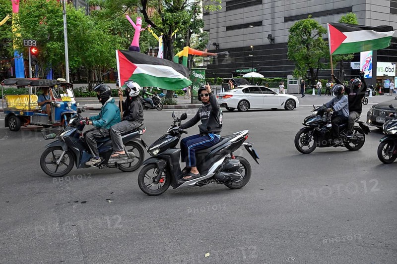 Motorcyclists with Palestine flags