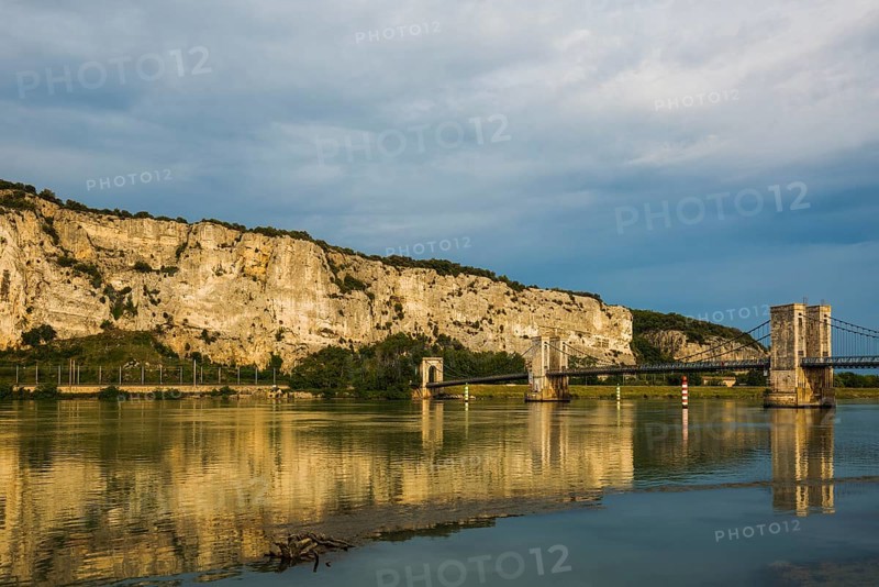 Old suspension bridge over the Rhone and rocks, Passerelle Marc Seguin, Tain-l'Hermitage, Département Ardèche, Auvergne-Rhône-Alpes, France, Europe