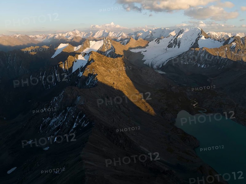 Evening mood, mountain panorama, aerial view, 4000 metre peak with glacier, mountain pass and mountain lake Ala-Kul Lake, Tien Shan, Kyrgyzstan, Asia