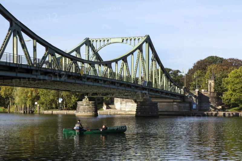Anglers in a boat at the Glienicke Bridge in Potsdam. The Glienicke Bridge today forms the city boundary between Berlin and Potsdam and was the borderline and a handover point for spies from East and West during the division of Germany, 22/09/2016