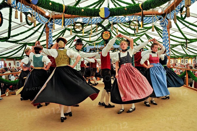 Dancers of a Bavarian folk dance group in traditional traditional costume dancing traditional dance, old festival tent, historic Wies'n, Oide Wiesn, Oktoberfest, Munich, Upper Bavaria, Bavaria, Germany, Europe