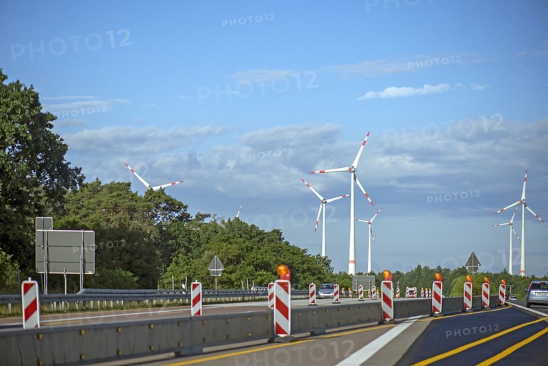 Wind turbines on the A 9 motorway, cloudy sky, Brandenburg, Germany, Europe