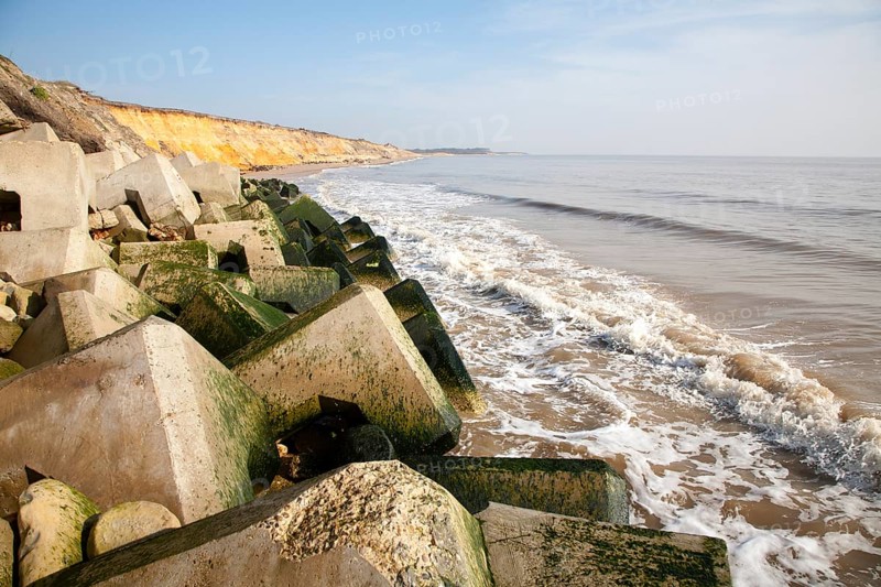 Concrete rectangular blocks protecting soft cliffs coastal defences at Easton Bavents, Southwold, Suffolk, England, United Kingdom, Europe