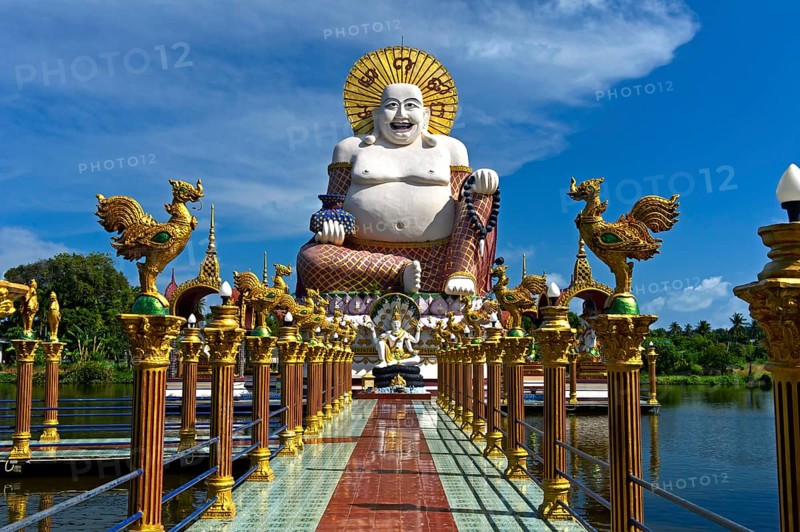 Laughing Buddha, larger-than-life statue in the Buddhist temple Wat Plai Laem, Koh Samui, Thailand, Asia