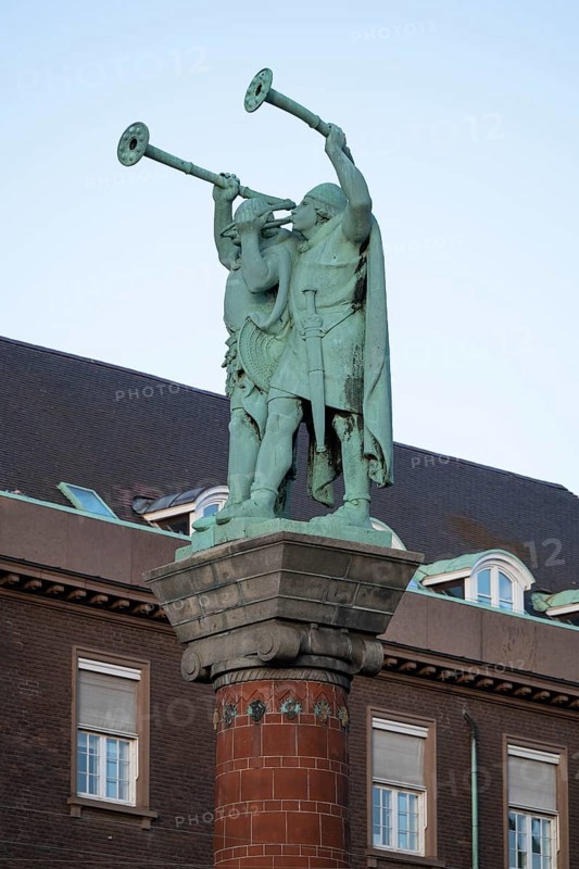 Lurspieler, antique trumpets, bronze sculpture on terracotta column, Town Hall Square, Rathausplatz or Rådhuspladsen, Copenhagen, Denmark, Europe