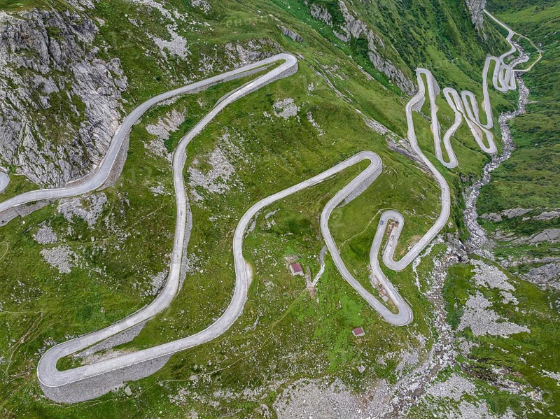 La Tremola, world-famous serpentine road through the Val Tremolo, road construction monument, Alpine pass with 24 hairpin bends. Old Gotthard Pass. Drone photo. Airolo, Canton Ticino, Switzerland, Europe