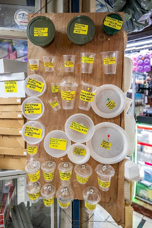 Disposable tableware for sale, display with prices at a stall, Mercado Central de San José, San José, Costa Rica, Central America