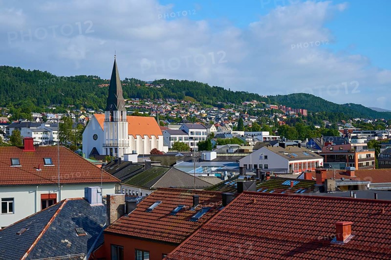 City of Molde with cathedral church and houses as well as mountains and sky in the background, Molde, Romsdal, Norway, Europe