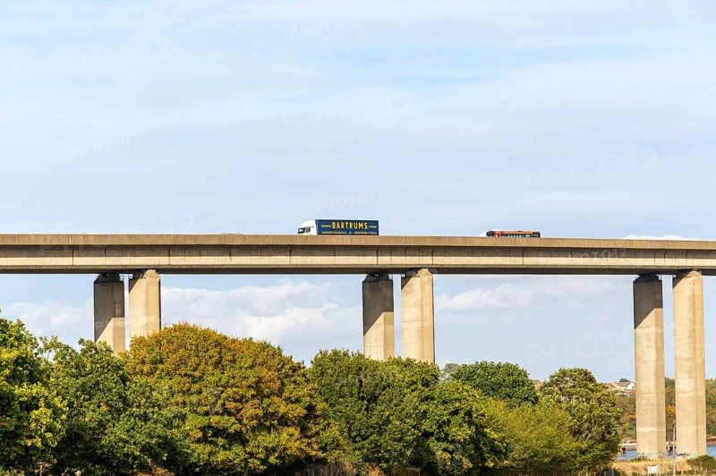 HGV truck lorry Bartrums vehicle driving on rasied section of Orwell Bridge, Suffolk, England, UK