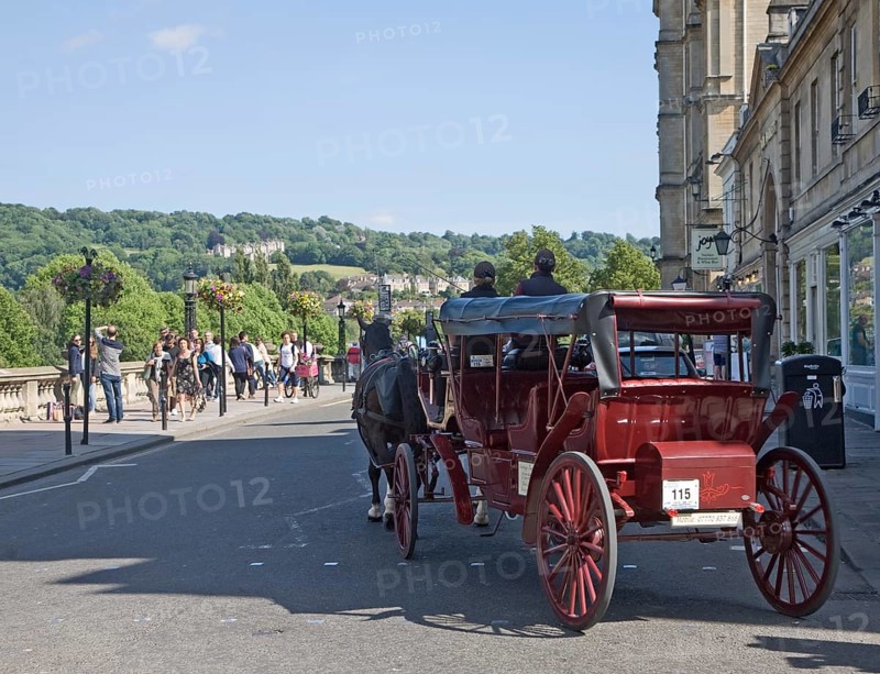 Horse drawn carriage tourist ride on Grand Parade, Bath, Somerset, England, United Kingdom, Europe