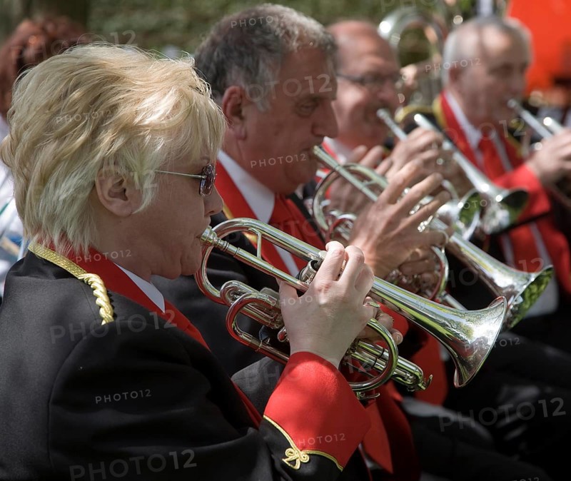 Musicians in a brass band perform during a country fair at Helmingham Hall, Suffolk, England, United Kingdom, Europe