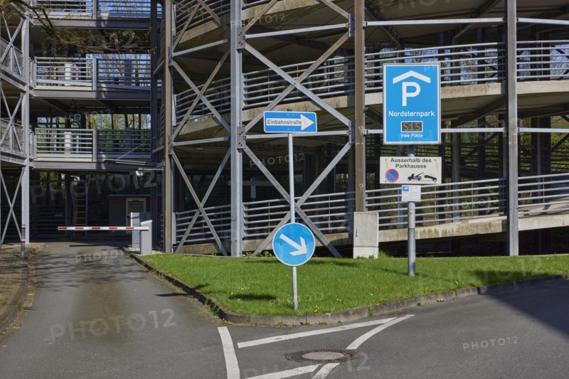 Traffic sign for the multi-storey car park and one-way street sign in Nordsternpark, Gelsenkirchen, Ruhr area, independent city, North Rhine-Westphalia, Germany, Europe