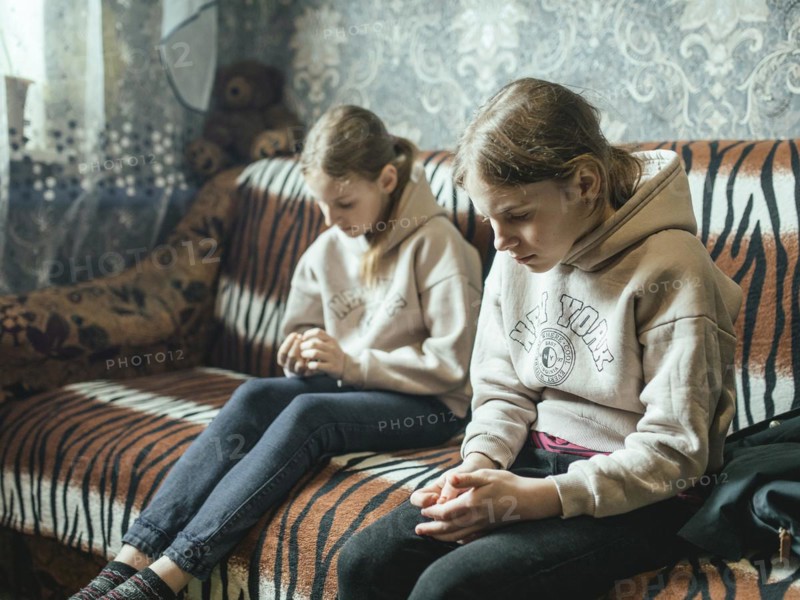 Sveta and Ira in their family home in Voloska Balakliia. The village is close to the front line, artillery fire can be heard every day, Voloska Balakliia, Kharkiv Oblast, Ukraine, Europe