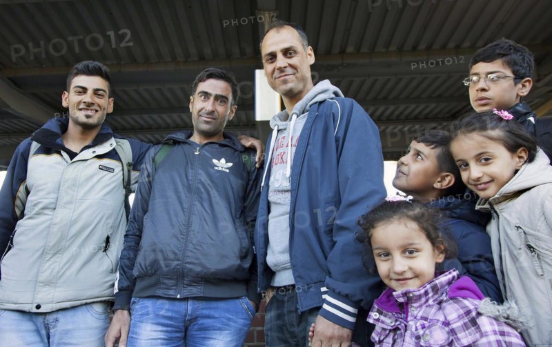 Syrian refugees arrive at Schönefeld station on a special train. They are then taken by bus to accommodation in Berlin, 01.10.2015