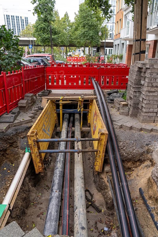 Construction site, excavation pit, work on supply lines, various types, electricity, water, gas, communication, in Düsseldorf North Rhine-Westphalia, Germany, Europe